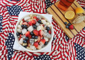 Food Lust People Love: Not so much of a recipe as a way to add flavor and sweetness, the flavored alcohol makes this boozy red white and blue fruit salad a great adult treat at any summer picnic.