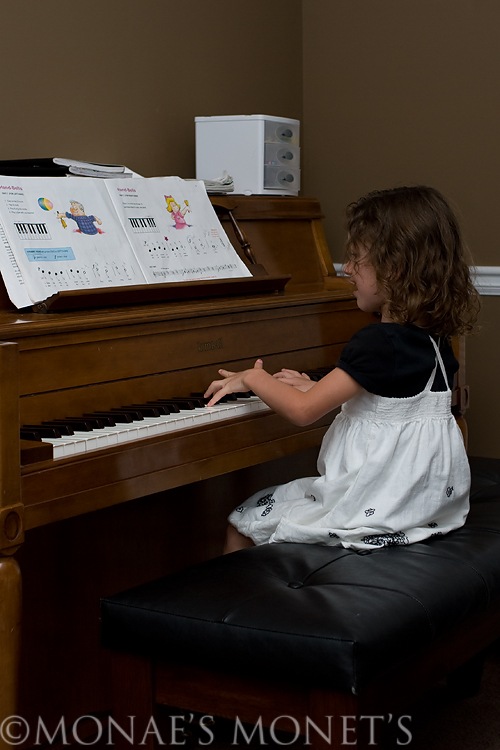 Abby playing piano blog