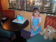 Here is the birthday girl with her cute Little Mermaid Dress and her .