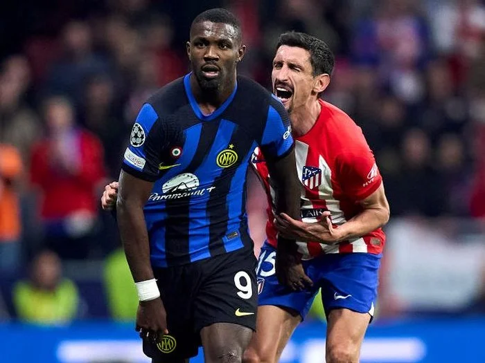 Marcus Thuram spotted grabbing Stefan Savić's private parts during match