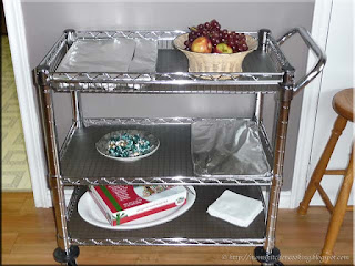 serving cart loaded with Christmas goodies in the games room