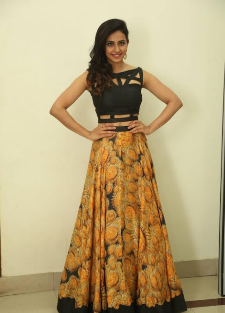 Rakul Preet Singh in Black Crop Top with Zipper Back and Yellow Printed Long Skirt