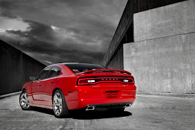 Rear 3/4 view of red 2011 Dodge Charger