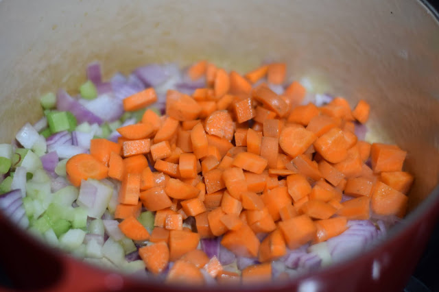 The carrots, celery, and onion sautéing in the pot.