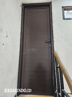 Pintu Kamar Mandi Aluminium terpasang di Rumah Bu Mela di Setu Babakan Srengseng Sawah Jakarta