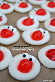 cream cheese, icing sugar and almond extract whipped into a dough and topped with a cocktail cherry - all in aid of Red Nose Day