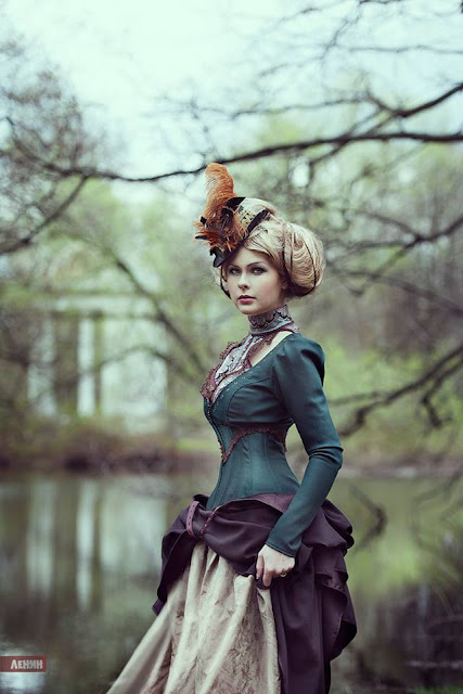 Victorian clothing for women. This girl is wearing a Victorian costume consisting of a hat, bodice and skirt.