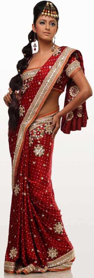 In Hindu weddings a bride would normally wear either a red bridal sari or a