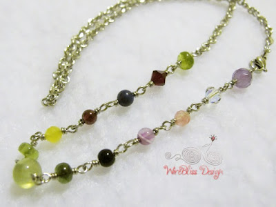 Wire wrapped necklace with Prehnite, Peridot, Garnet, faceted and round Amethyst, Swarovski Crystal, Agate and Tourmaline