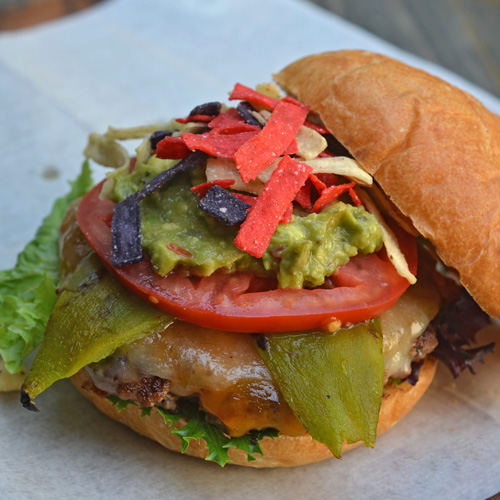 Recipe for a grilled hatch chile and guacamole burger