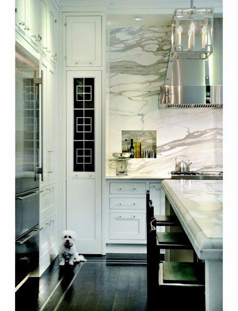 beautiful gray and white marble granite kitchen  backsplash thick white marble counter top dark wood floors