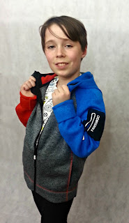 Boy modelling ReimaGO fleece jacket