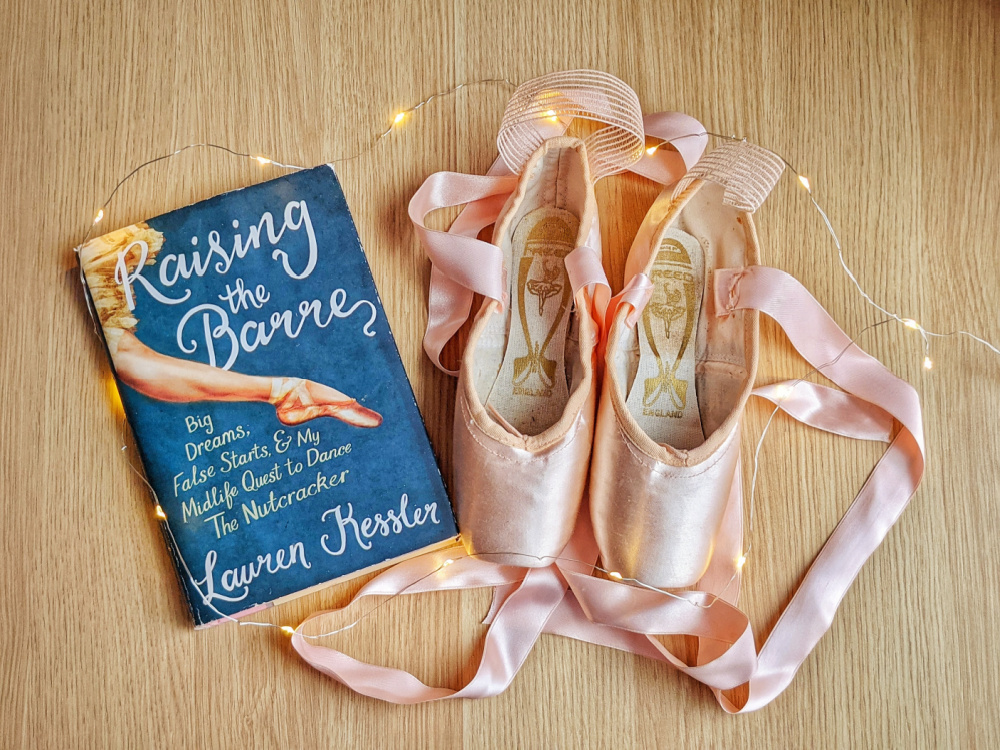 Memoir Raising the Barre by Lauren Kessler, fairy lights, and pointe shoes.