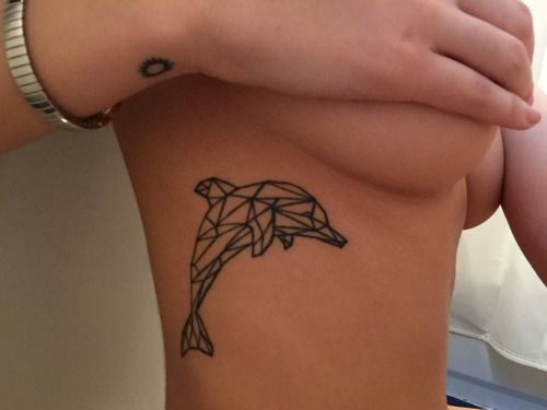Geometric-Dolphin-Ribs-Side-Tattoo