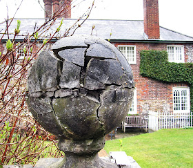 Weathered gate ball at The Clock House, High Elms