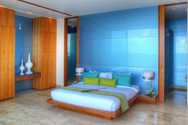 Bedroom with blue wall 