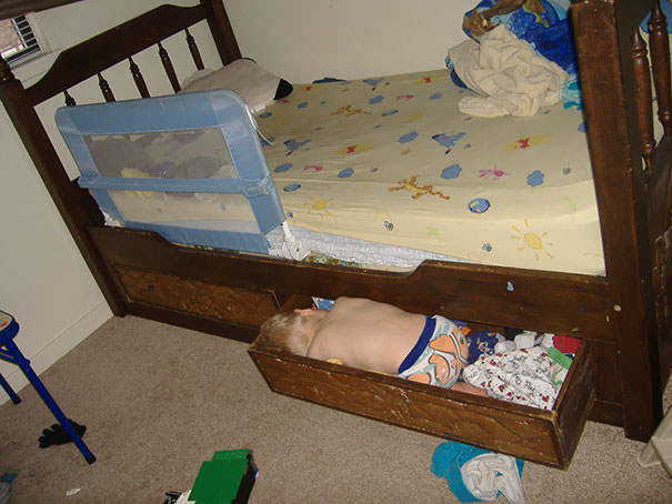 15+ Hilarious Pics That Prove Kids Can Sleep Anywhere - Napping In A Drawer Under The Bed