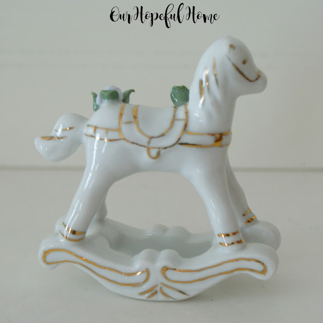 Vintage Enesco porcelain rocking horse with gilding and flowers