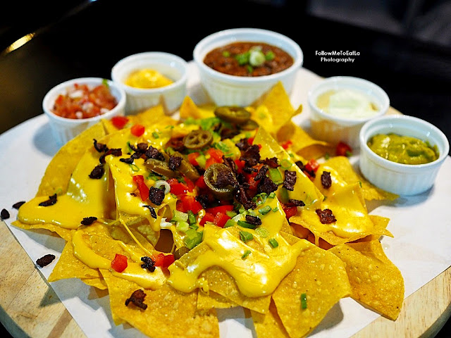 A delightful platter of Ultimate Nachos (RM40).