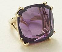 Dark amethyst and yellow gold ring