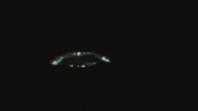 Electricity surrounding a UFO changes colour and it's a truly wonderful UFO.