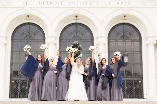 bridesmaids at detroit institute of arts cheering
