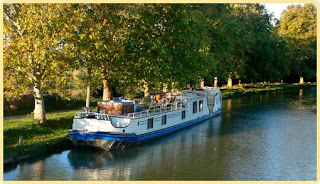 Cruise the canal du midi in the south of France aboard the French hotel barge Clair de Lune - Contact ParadiseConnections.com for more details