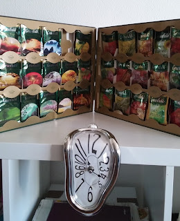 A box of Greenfield tea and Salvador Dali clock