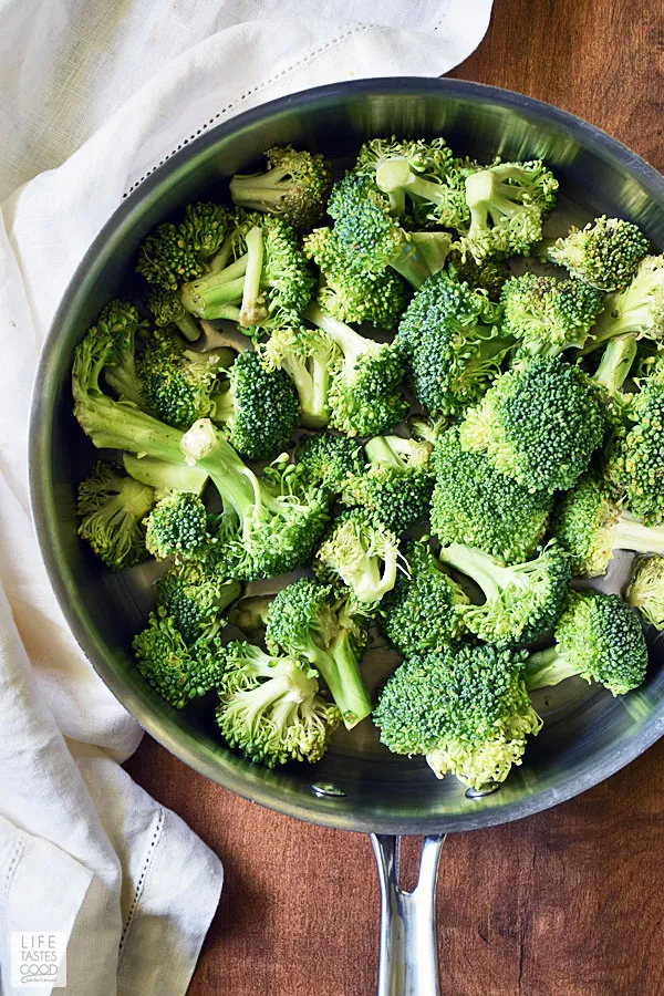 Fresh broccoli in pan to show how to steam broccoli without a steamer basket