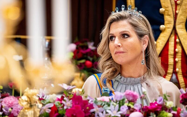 Queen Maxima wore an iridescent multicolor georgette long dress, gown from Luisa Beccaria. Aquamarine tiara set