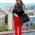 Red jeans black top