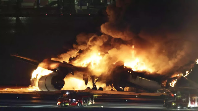 Planes collide in Tokyo, passengers and crew escape blazing fire