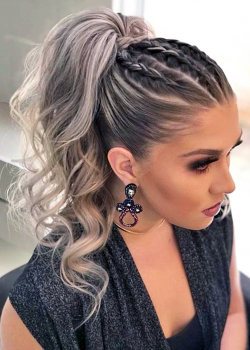 Peinados recogidos con trenzas: coleta glam con trenzas de raíz