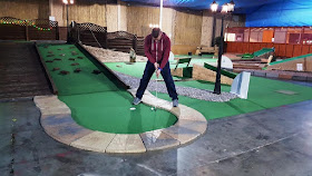Playing at Holey Molies Miniature Golf in Skelton-in-Cleveland
