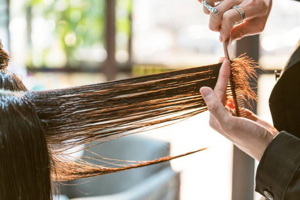 hairdresser cutting straight hair