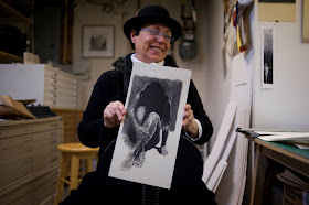 Mera Rubell selecting a Lenny Campello drawing