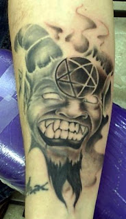 demon tattoo