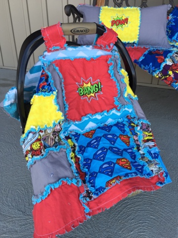 Superhero themed rag quilt car seat tent with superman, spiderman, hulk, and batman