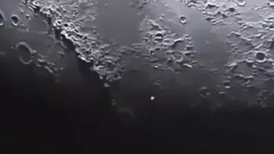 UFO Sightings over the Moon.