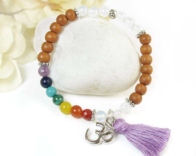 https://www.etsy.com/prettygonzo/listing/573134413/yoga-bracelet-for-women-tassel-om?ref=shop_home_feat_4&frs=1