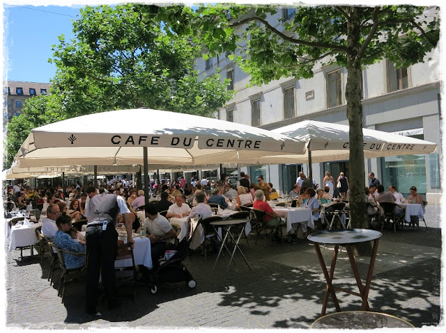 Sidewalk cafés on the Place du Molard, Geneva, Switzerland.