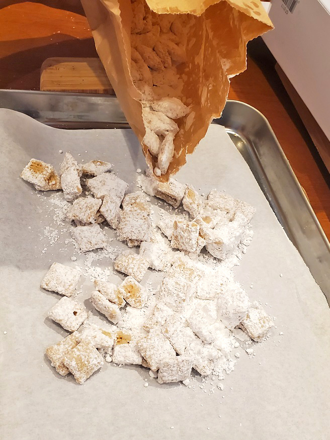 coated cereal for a snack with peanut butter and powdered sugar