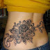 Lotus In Water With Snake Tattoo Designs On Women Hip