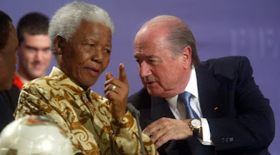 Nelson Mandela with Fifa president Sepp Blatter. You could say a force of good meets a force of evil ...