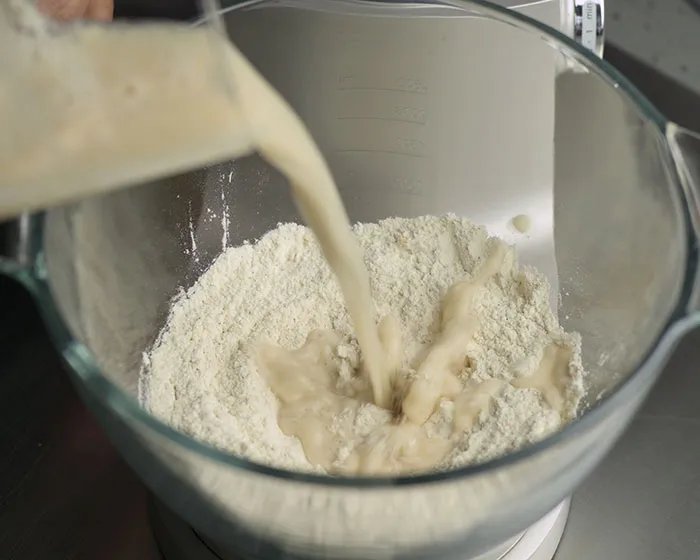 Add yeast mixture that we prepared earlier to the bowl