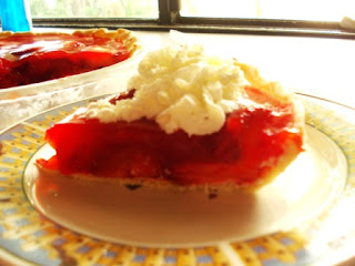 A slice of fresh strawberry pie