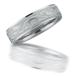 Platinum engraved ring by Novell