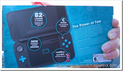 The back side of the Nintendo 2 DS XL box.