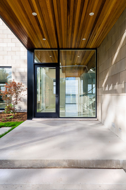 Entrance doors in Amazing Ottawa River House by Christopher Simmonds Architect