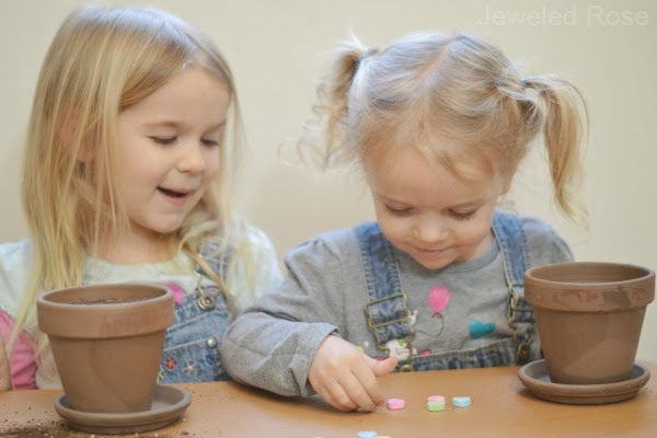 Wow kids of all ages and grow lollipops!  All you need are "magic seeds"! #growalollipop #growlollipops #valentinesday #valentinecrafts #growingajeweledrose #activitiesforkids